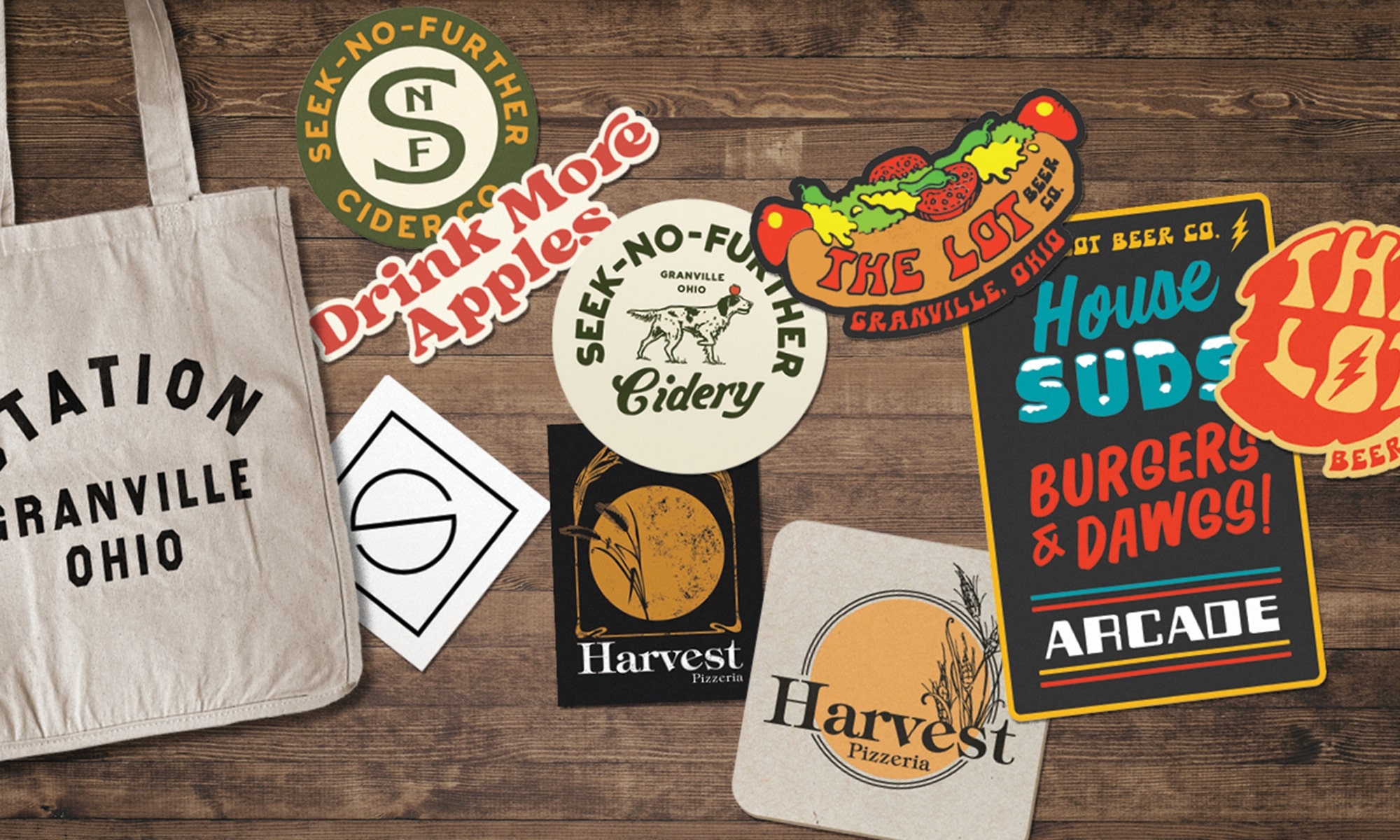 Coasters and stickers from restaurants around Granville