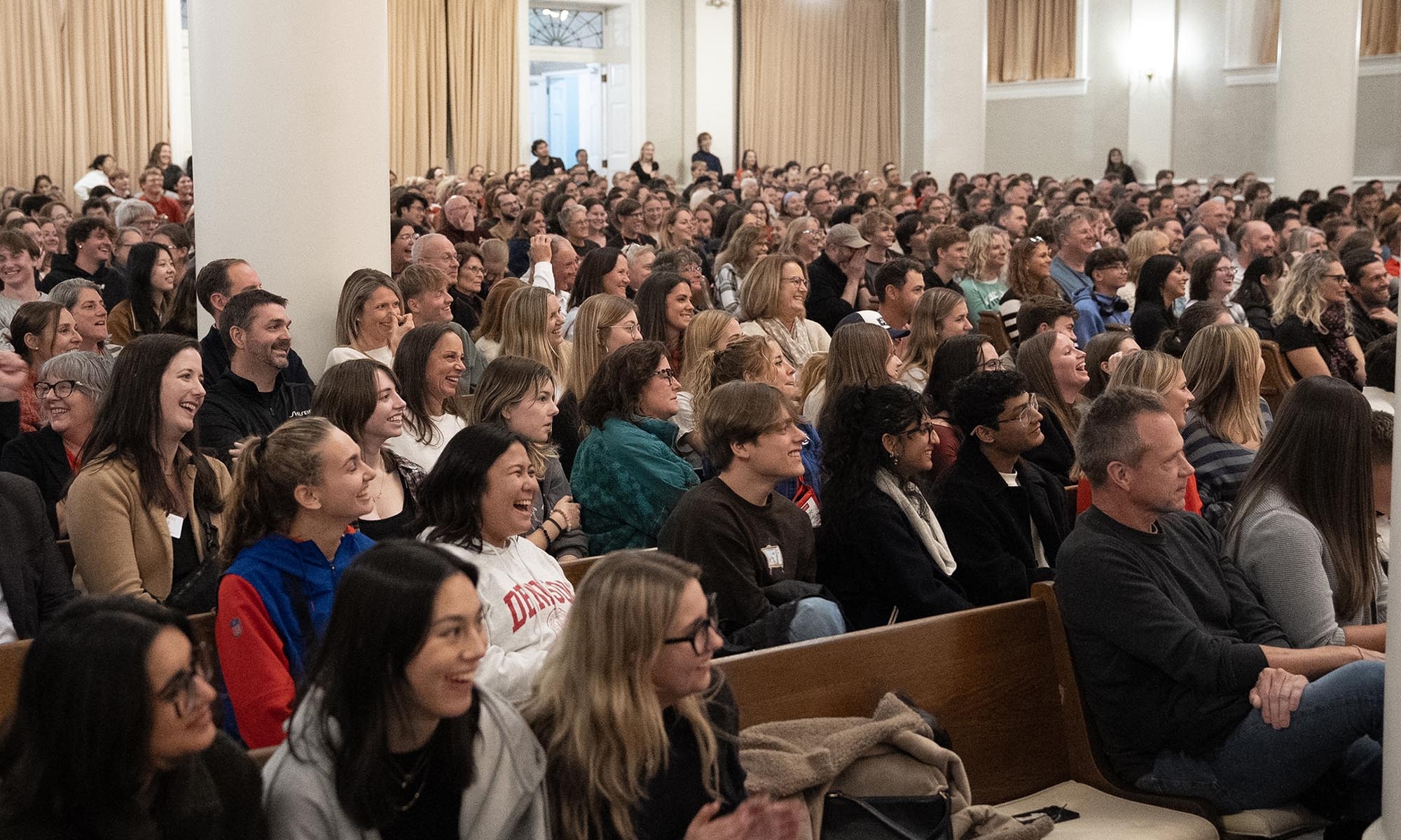 Audience members enjoying a performance in Swasey Chapel.