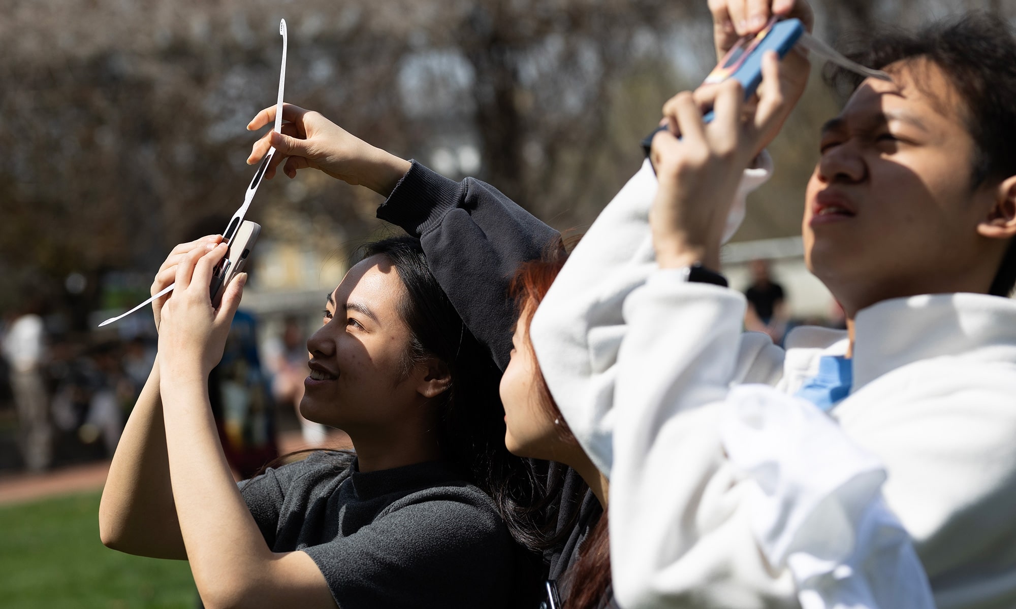 Students watching the solar eclipse