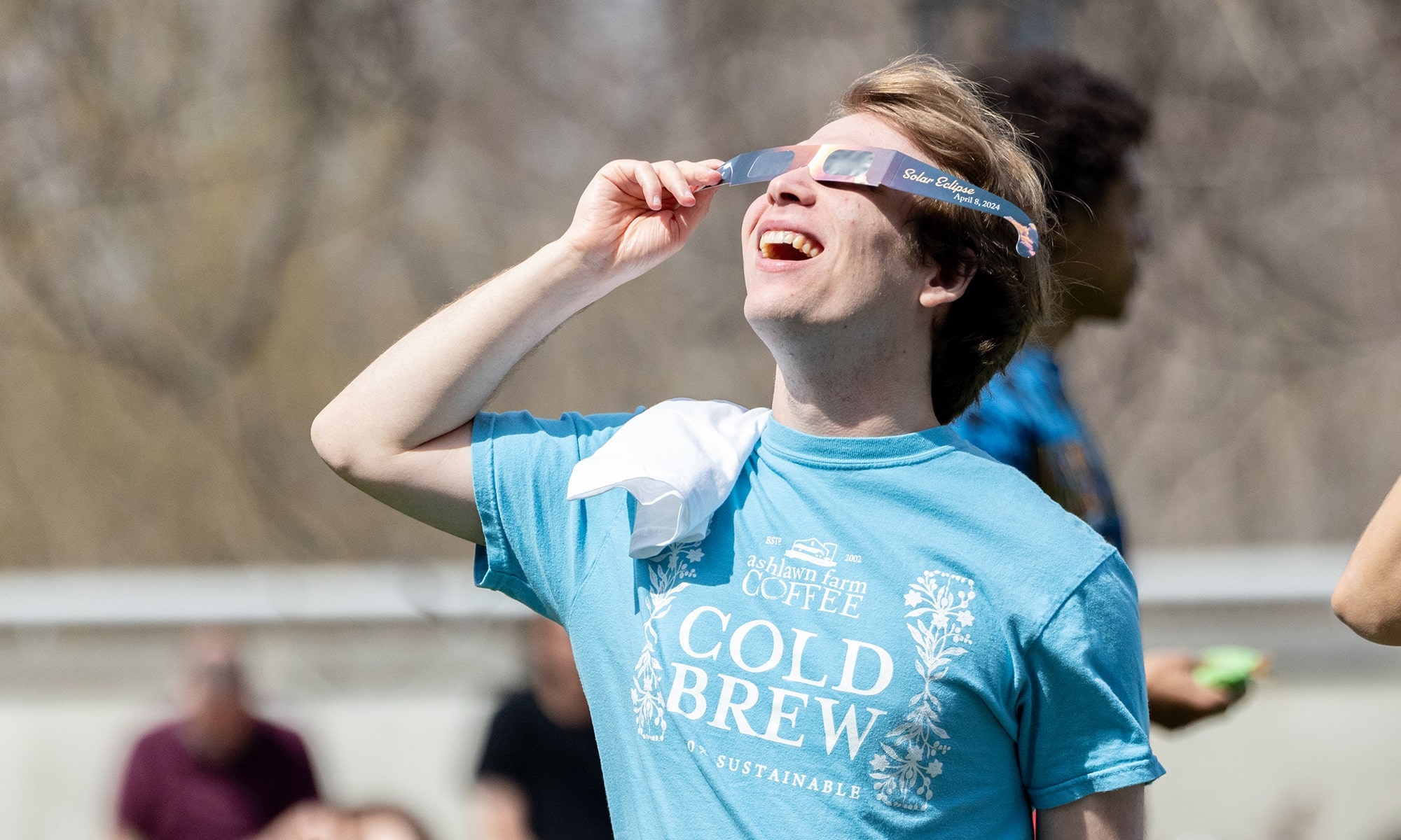 Student watching the solar eclipse