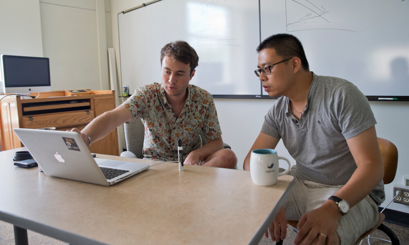 two people at a desk