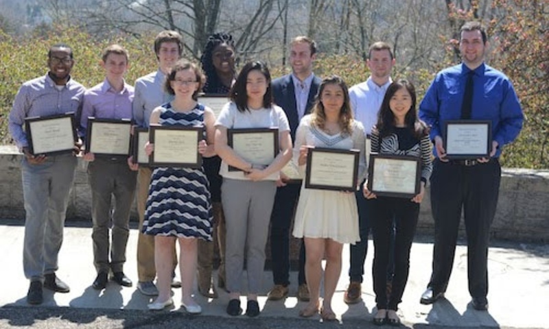 denison students posed with awards